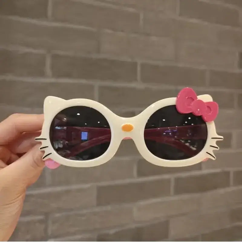 Image of Adorable Hello Kitty Sunglasses: Stylish eyewear for girls (3-8 years), perfect for sunny adventures! Shop now at OleOle.