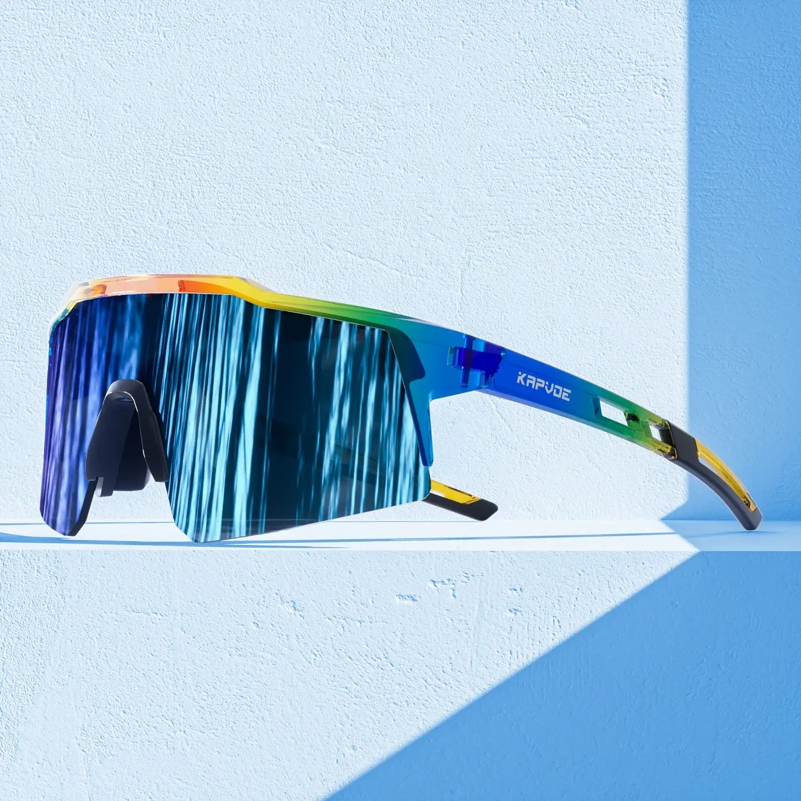 Kids polarized sports goggles with colorful frame and blue mirror lenses, perfect for outdoor adventures.