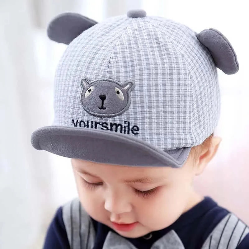 Image of Baby Baseball Caps: Stylish & Protective Hats for 6m - 3 years, On Sale Now! Shield your little one with fashion and sun safety. Shop today at OleOle!