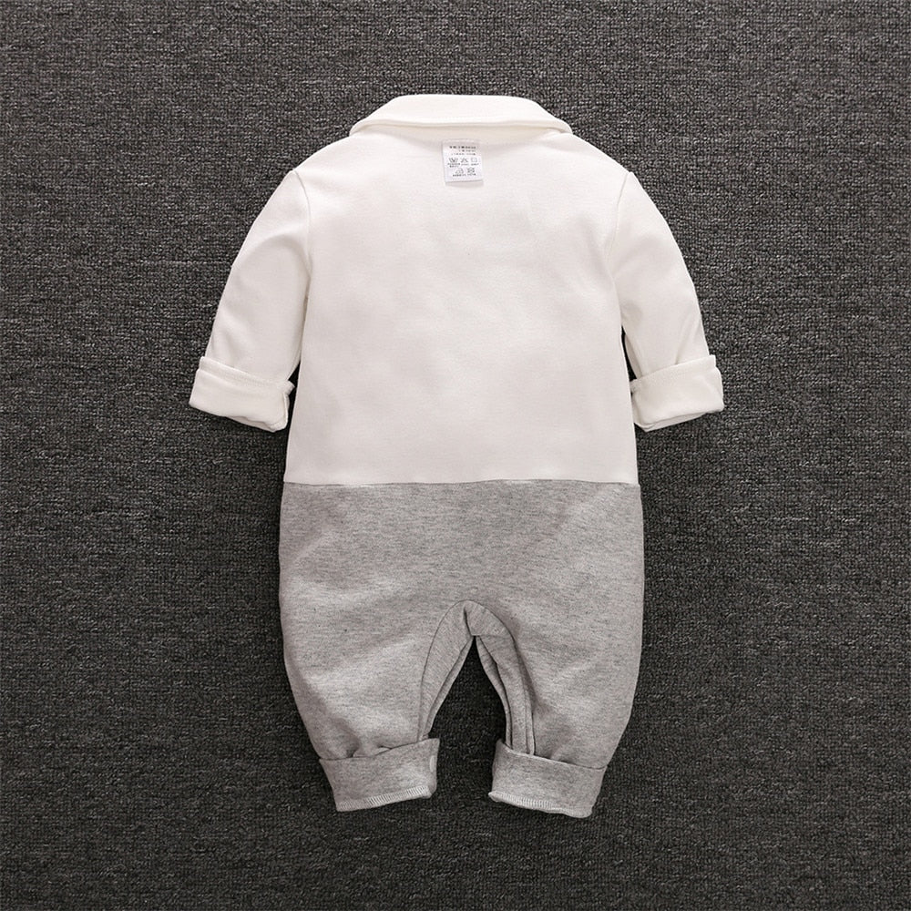 Image of Winter charm for newborn - Boys' romper with necktie, 0-18 months. Gentleman style in cosy fashion. Shop now at OleOle.