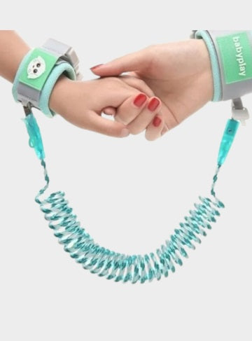 Image of a woman hand holding a child's hand wearing Anti-lost Walking Safety Harness - it is used at OleOle Baby Accessories Collection Page