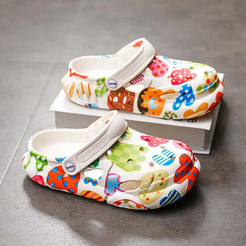 Image of colourful children's clogs featuring stylish anime characters with comfortable holes design. Buy now at OleOle.