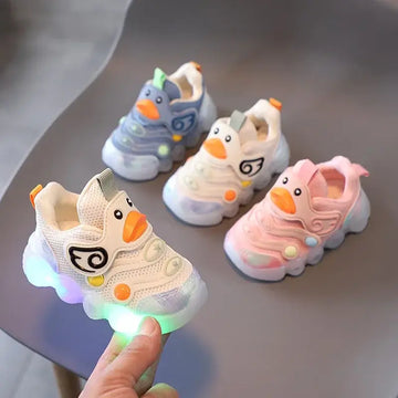 Colorful Shoes with Lights for Kids featuring duck designs, light-up sneakers in pink, blue, and white for playful adventures.