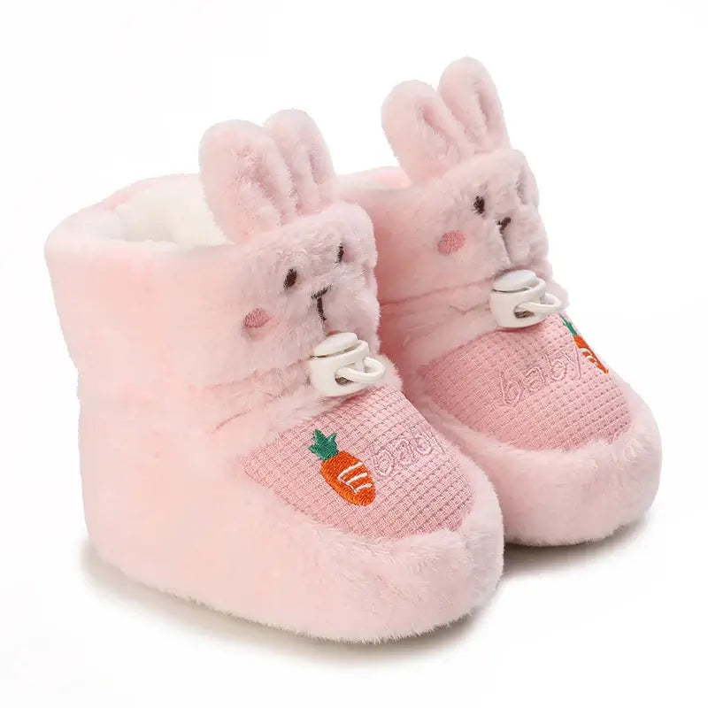 Anime design winter shoes for newborns, plush warmth, soft cloth sole, winter protection, suitable for baby aged 0-18 months.