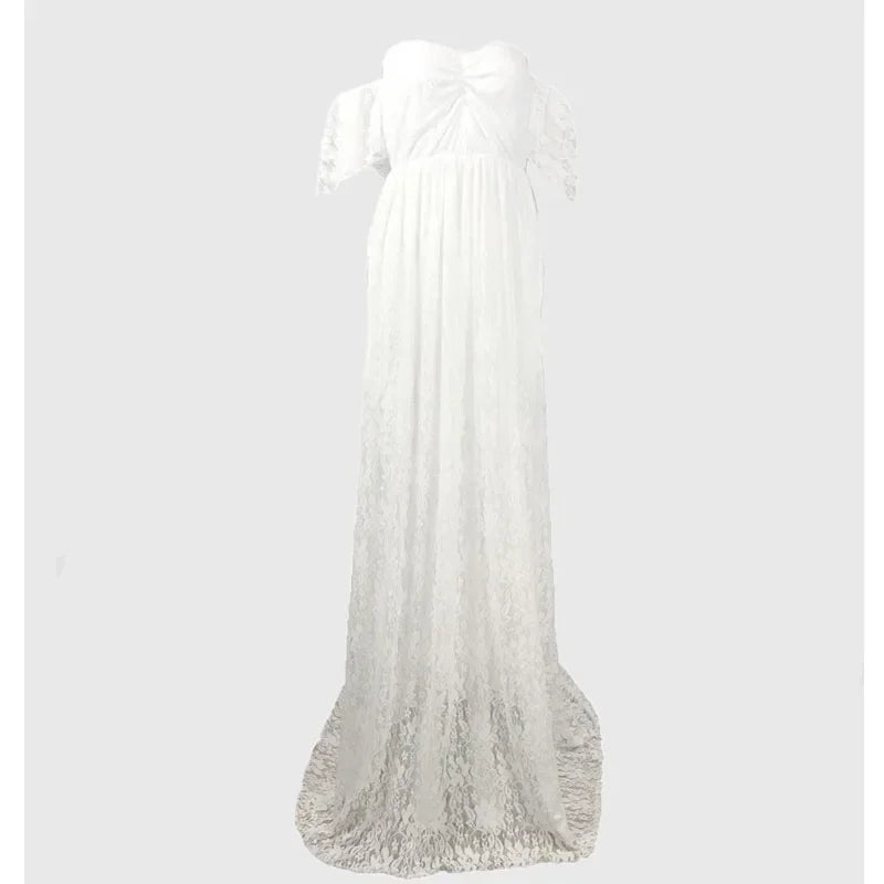 White lace dress on a mannequin against a light gray background