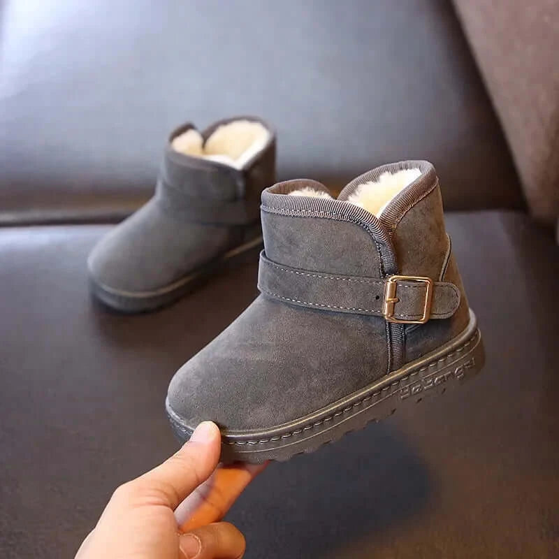 Image of Kids stylish and warm snow boots for snowy mountain adventure. Shop now at OleOle.