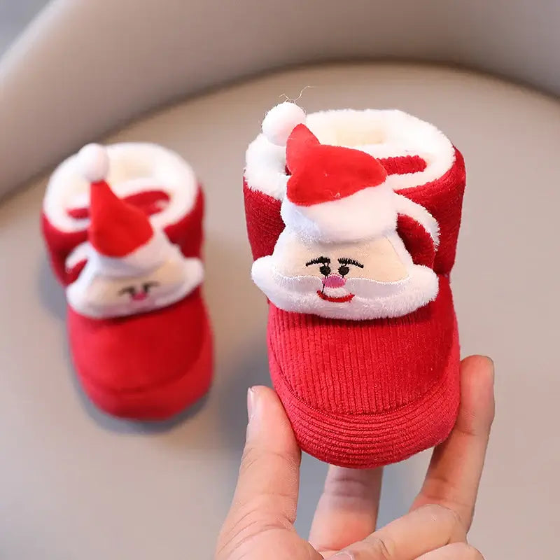 Anime design winter shoes for newborns, plush warmth, soft cloth sole, winter protection, suitable for baby aged 0-18 months.