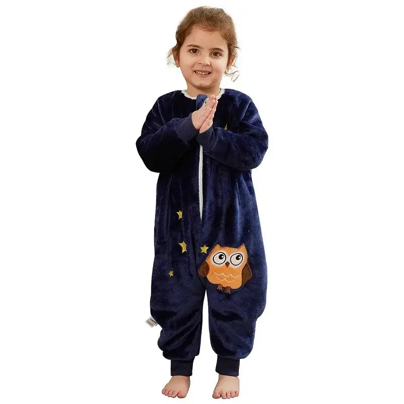 Child in navy flannel warm onesie sleepsack featuring owl and star design, perfect for cozy and playful dreams.