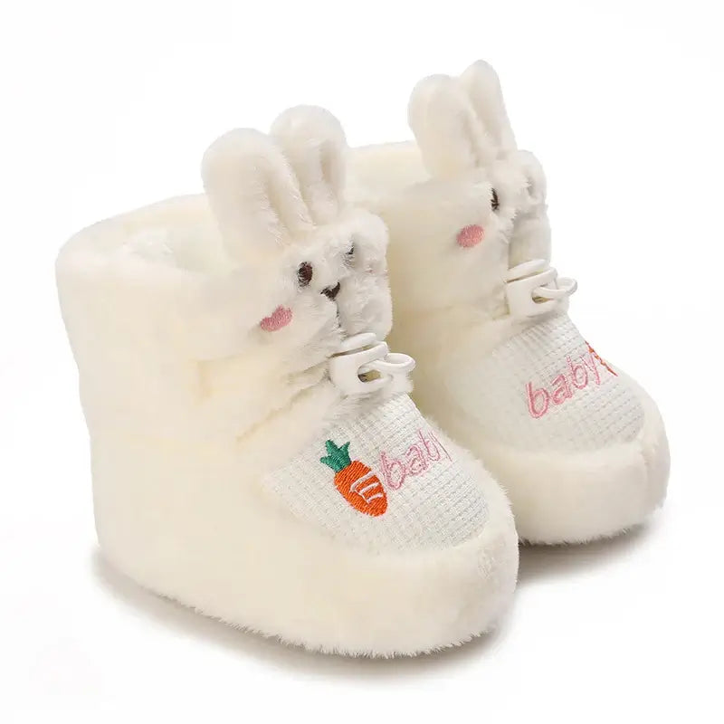 Anime design winter shoes for newborns, plush warmth, soft cloth sole, winter protection, suitable for baby aged 0-18 months.