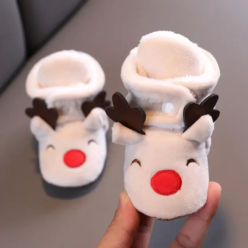 Anime design winter shoes for newborns, plush warmth, soft cloth sole, winter protection, suitable for baby aged 0-18 months.