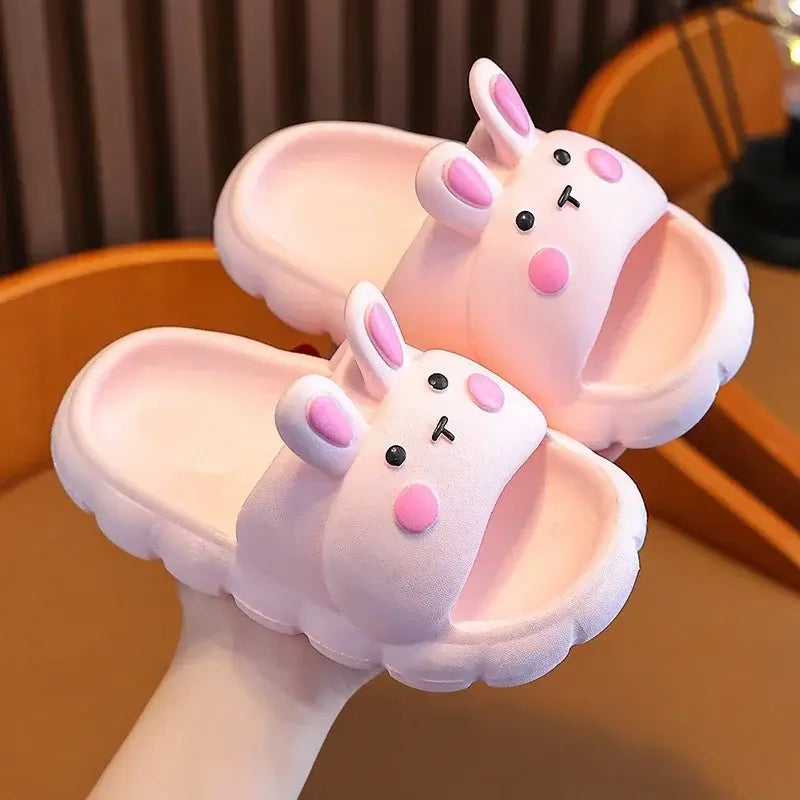 Cute baby girl bunny slippers in pink, perfect for toddlers and kids ages 1-7 for comfort and fun.