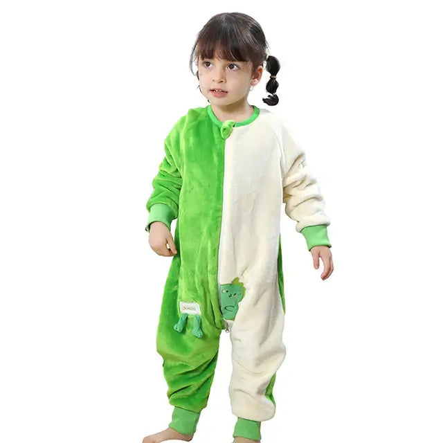 Little girl in a cozy green and cream flannel onesie sleepsack, perfect for warm and comfortable sleep.