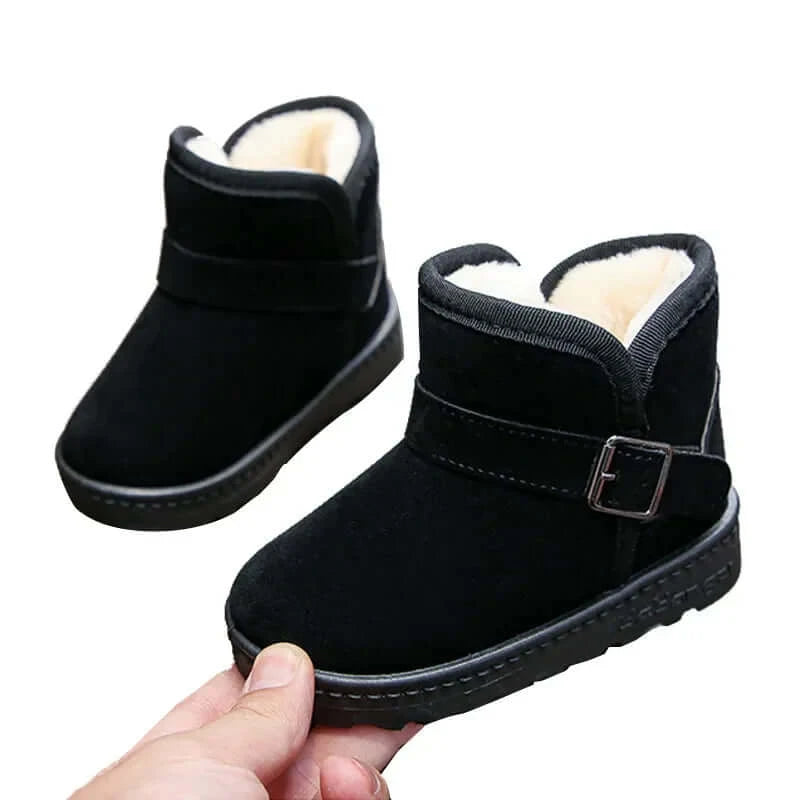 Image of Kids stylish and warm snow boots for snowy mountain adventure. Shop now at OleOle.