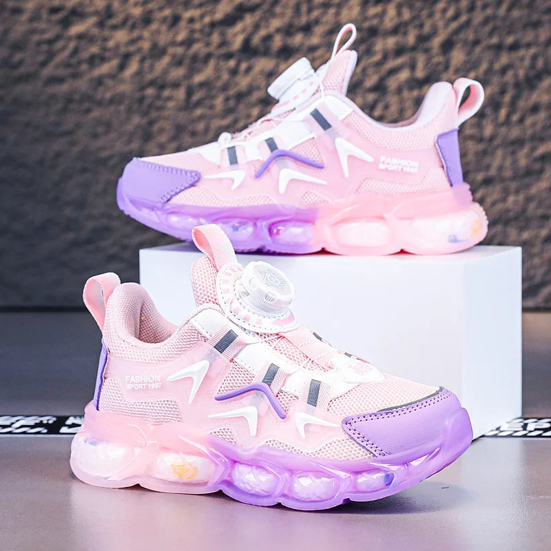Pink and purple sneakers on a reflective surface with a blurred background