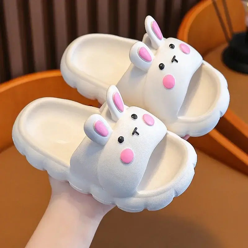 Cute cartoon bunny slippers for baby girls, perfect for toddlers ages 1-7, combining comfort and fun.