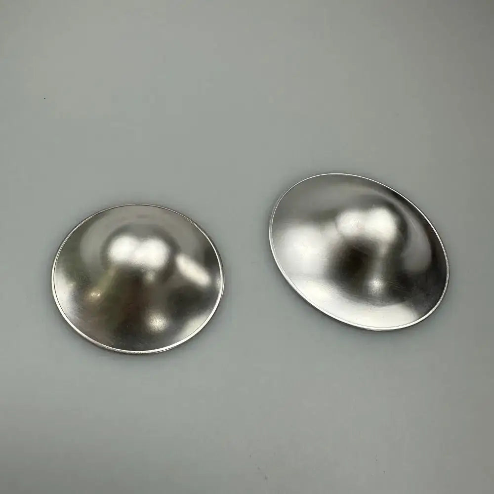 Two  silicone nipple covers on a gray background