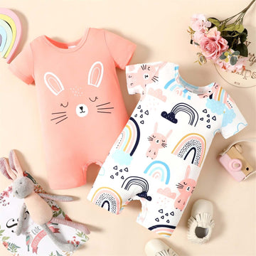 Image of adorable short-sleeve romper jumpsuit for newborn baby girls ages 0 to 18 months available at OleOle. A cute and comfortable outfit for your little one's first adventures.