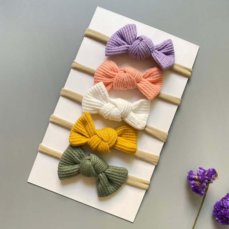 A set of 5 OleOle baby girl headband bows, perfect for adding a touch of elegance to any outfit.