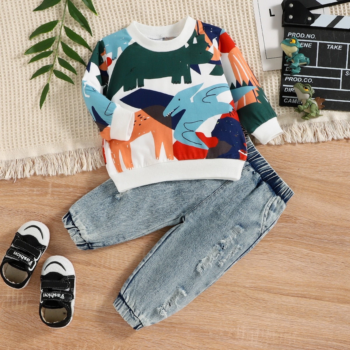 Image of Stylish 2-Piece sweatshirt & ripped jeans set for baby boys (3m-2yrs). Adorable comfort for every little one! Shop now at OleOle.