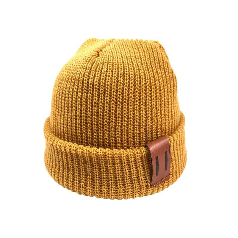 Image of Adorable handmade knitted winter caps for baby girls & boys ages 1-4yrs. Stay cosy in style with our charming collection. Perfect cold-weather accessories!