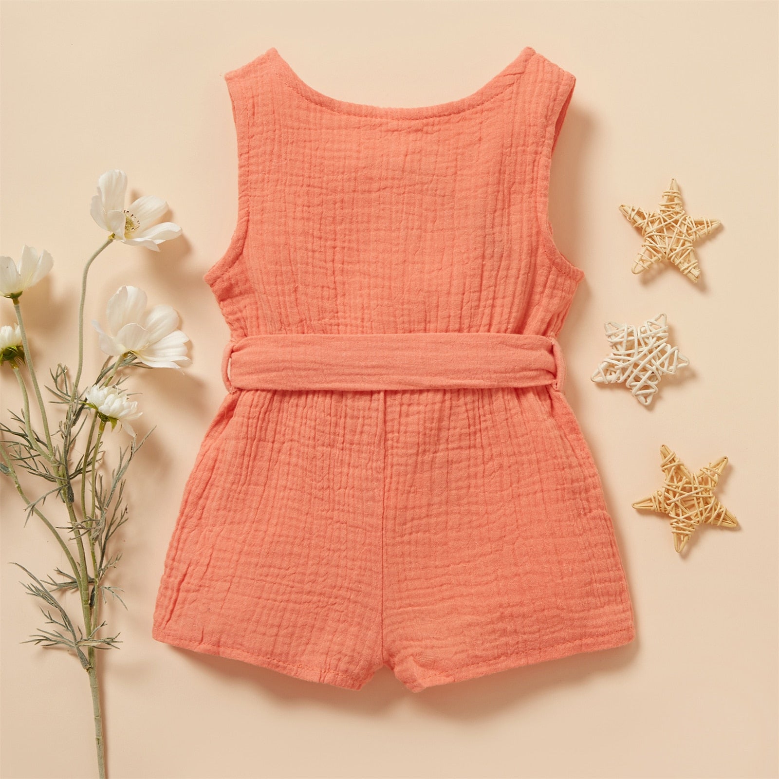 Image of Chic and comfy Premium Linen Sleeveless Romper for baby girls ages 0-18 months. Adorable style for every little fashionista. Buy now for your precious one at OleOle.