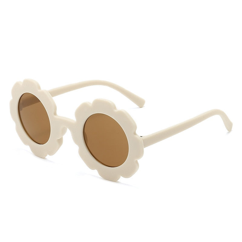 Image of UV-proof sunflower sunglasses for baby boys and girls (1-8 yrs). Adorable eye protection! Shop now at OleOle.