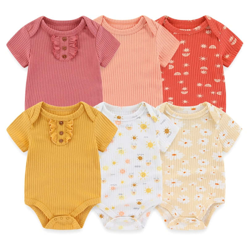 A Set of 6 Handmade Unisex Baby Jumpsuits, perfect for your little one from OleOle.