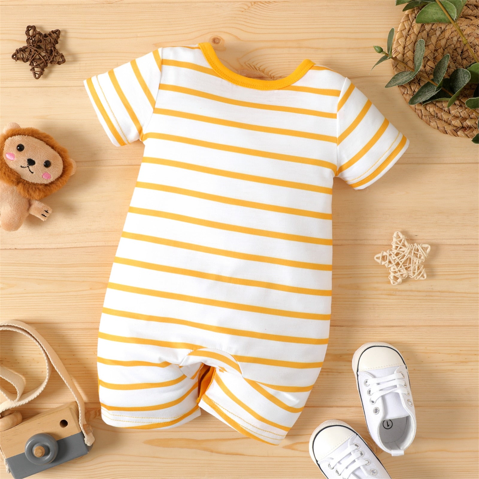 Image of Chic Summer Romper: Infants 0-18 Months. Comfortable Short Sleeve Bodysuit for Stylish Little Ones. Shop now at OleOle.