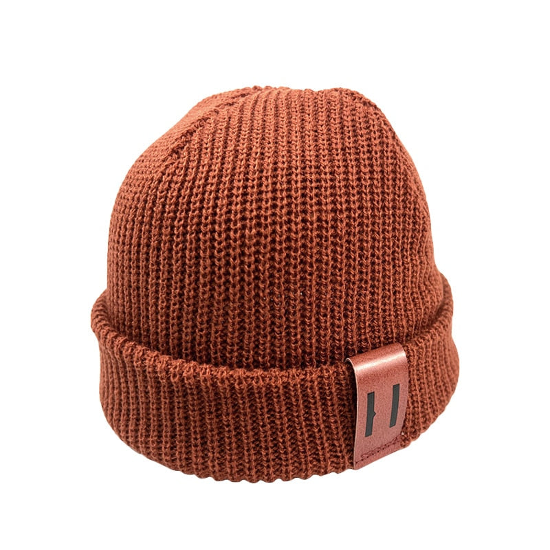 Image of Adorable handmade knitted winter caps for baby girls & boys ages 1-4yrs. Stay cosy in style with our charming collection. Perfect cold-weather accessories!