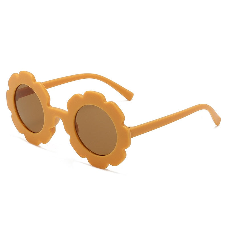 Image of UV-proof sunflower sunglasses for baby boys and girls (1-8 yrs). Adorable eye protection! Shop now at OleOle.