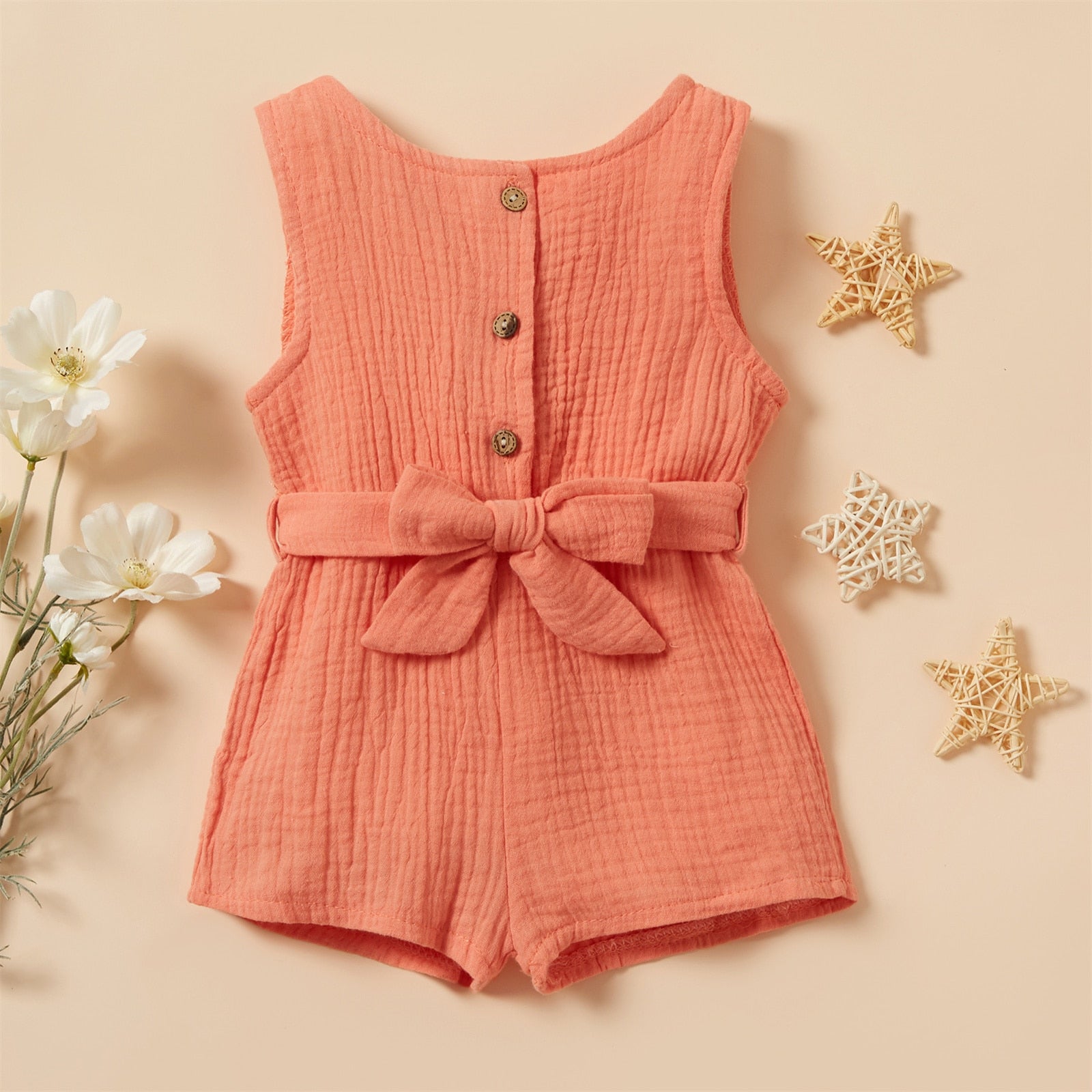 Image of Chic and comfy Premium Linen Sleeveless Romper for baby girls ages 0-18 months. Adorable style for every little fashionista. Buy now for your precious one at OleOle.