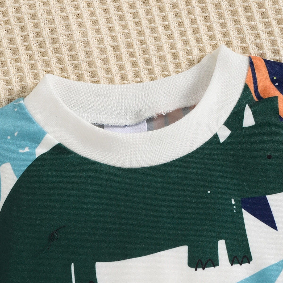 Image of Stylish 2-Piece sweatshirt & ripped jeans set for baby boys (3m-2yrs). Adorable comfort for every little one! Shop now at OleOle.