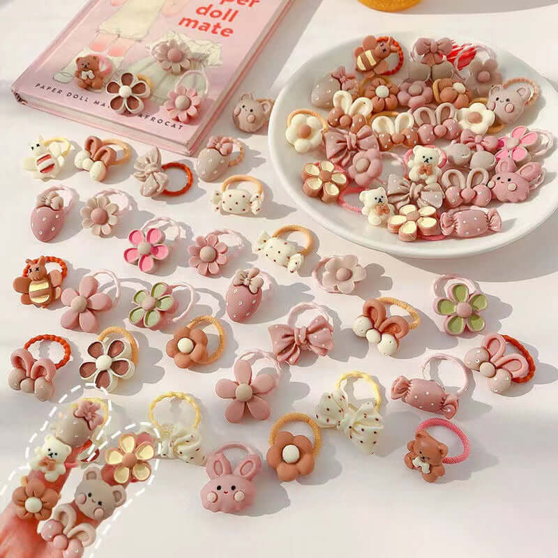 A set of 20 rubber bands for girls by OleOle, featuring cute animal hair designs. Perfect for adding a touch of fun to any hairstyle.