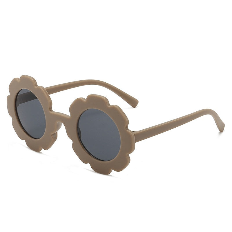 Image of UV-proof sunflower sunglasses for baby boys and girls (1-8 yrs). Adorable eye protection! Shop now at OleOle.