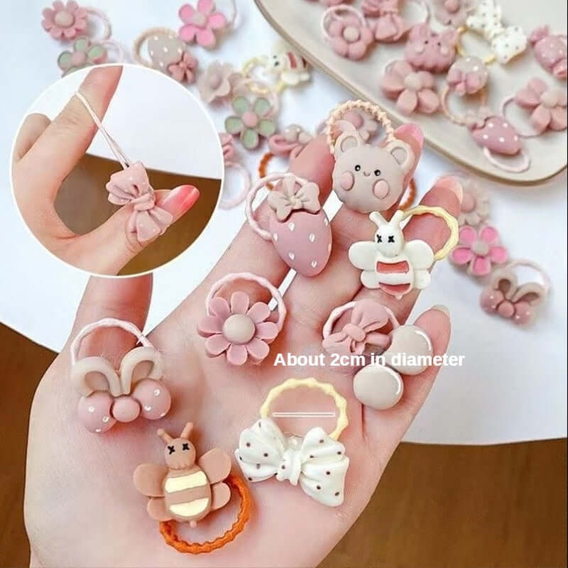 A set of 20 rubber bands for girls by OleOle, featuring cute animal hair designs. Perfect for adding a touch of fun to any hairstyle.