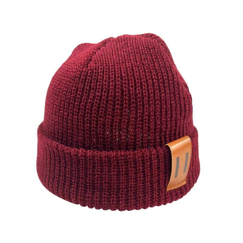 Image of Adorable handmade knitted winter caps for baby girls & boys ages 1-4yrs. Stay cosy in style with our charming collection. Perfect cold-weather accessories!