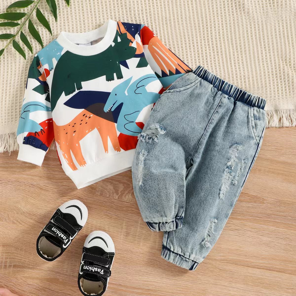 Image of Stylish 2-Piece sweatshirt & ripped jeans set for baby boys (3m-2yrs). Adorable comfort for every little one! Shop now at OleOle.