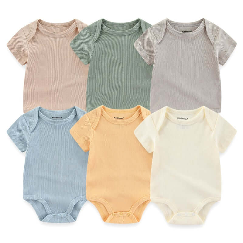 A Set of 6 Handmade Unisex Baby Jumpsuits, perfect for your little one from OleOle.