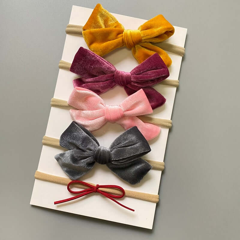 A set of 5 OleOle baby girl headband bows, perfect for adding a touch of elegance to any outfit.