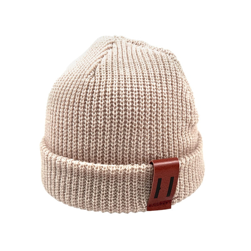 Image of Adorable handmade knitted winter caps for baby girls & boys ages 1-4yrs. Stay cosy in style with our charming collection. Perfect cold-weather accessories!