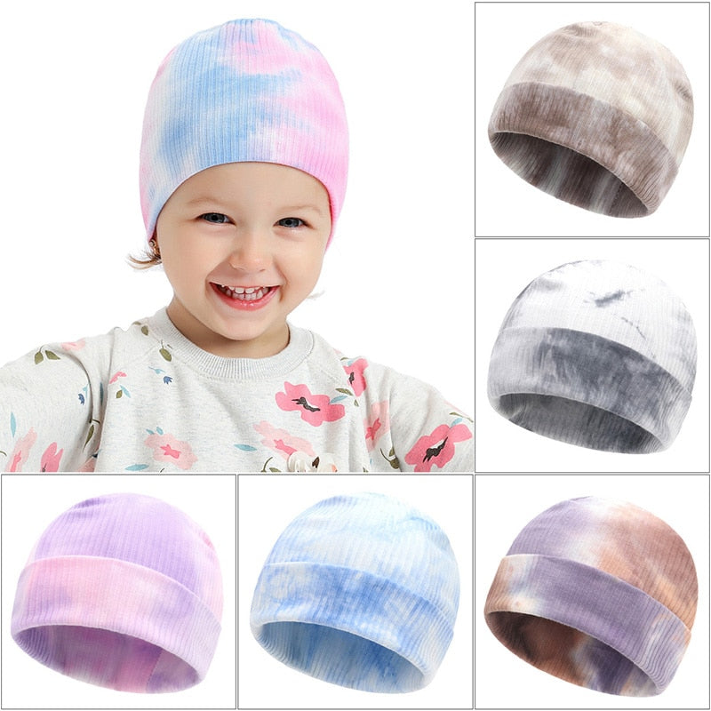 Image of Adorable handmade knitted winter caps for baby girls & boys ages 1-4yrs. Stay cosy in style with our charming collection. Perfect cold-weather accessories!