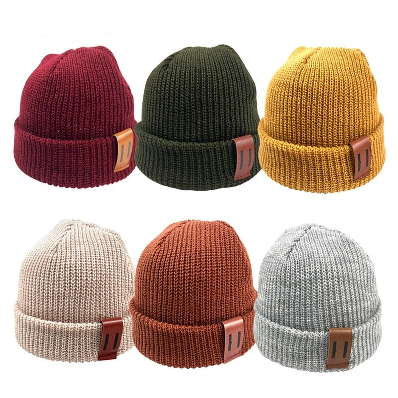 Image of Adorable handmade knitted winter caps for baby girls & boys ages 1-4yrs. Stay cosy in style with our charming collection. Perfect cold-weather accessories!